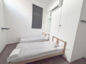Posteľ alebo postele v izbe v ubytovaní Artist Guest House