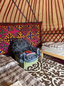 Postel nebo postele na pokoji v ubytování Yurt camp Sonun