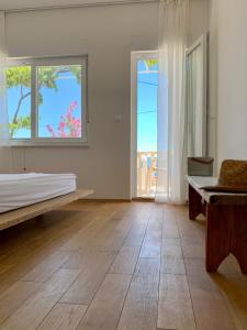 a bedroom with a bed and a view of the ocean at Vacation home ĆaĆa in Jesenice