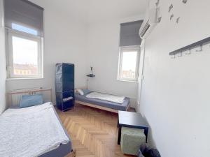 Posteľ alebo postele v izbe v ubytovaní Artist Guest House