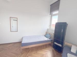 Posteľ alebo postele v izbe v ubytovaní Artist Guest House