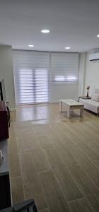a living room with a couch and a coffee table at Alicante 30 in Alicante