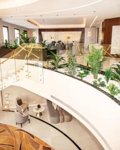 an image of a lobby with plants at Villa Misk Alkhobar in Al Khobar