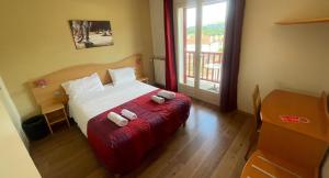 Postel nebo postele na pokoji v ubytování Hostel Ramuntcho