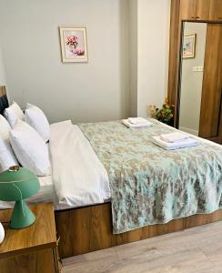 En eller flere senge i et værelse på Sunset at Greenside - Sea & Mountain View + 20 billeder