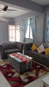 Χώρος καθιστικού στο Qiffah Homestay