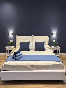 Letto o letti in una camera di L'Abbraccio di Parthenope