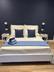 Letto o letti in una camera di L'Abbraccio di Parthenope