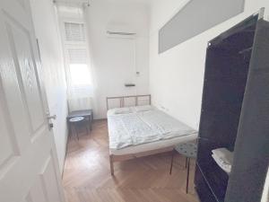 Posteľ alebo postele v izbe v ubytovaní Artist Guest House