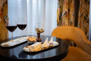 Nápoje v ubytovaní Torre Argentina Relais - Residenze di Charme