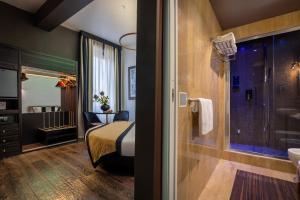 Kúpeľňa v ubytovaní Torre Argentina Relais - Residenze di Charme