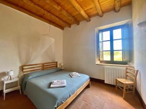 En eller flere senge i et værelse på Antico Baglio Siciliano