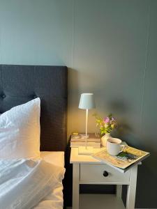 Postel nebo postele na pokoji v ubytování ÁILU - Arctic Hotel Apartments
