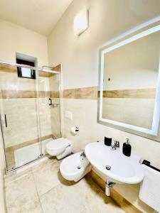 Koupelna v ubytování Hotel Paradise Rooms