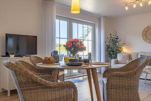 TV a/nebo společenská místnost v ubytování fewo1846 Strandresidenz Wassersleben - HolidayWassersleben App 648