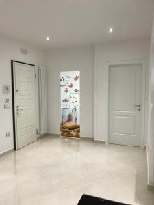 セニガッリアにあるLa Casa di Ale Beachの白い部屋