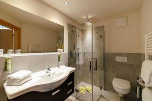 Koupelna v ubytování Hotel Pfeiss