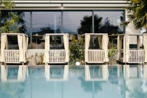 Bazén v ubytování Hotel Pfeiss nebo v jeho okolí