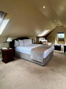 Posteľ alebo postele v izbe v ubytovaní Baileys Hotel Cashel