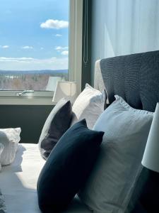 Postel nebo postele na pokoji v ubytování ÁILU - Arctic Hotel Apartments