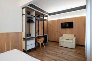 TV a/nebo společenská místnost v ubytování Hotel Italia