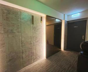 Baðherbergi á 新仕飯店-New City Hotel