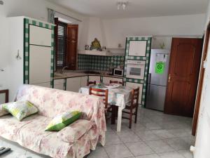 Kuchyňa alebo kuchynka v ubytovaní Casa Amaranto + 32 fotografií