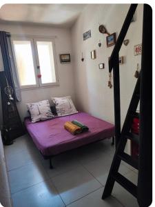 Postel nebo postele na pokoji v ubytování Chez Béné