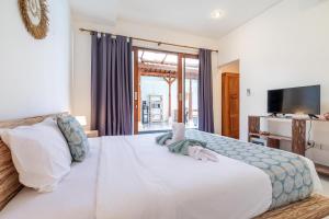Private Suite in Tropical Pool Villa客房内的一张或多张床位
