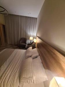 Postel nebo postele na pokoji v ubytování مسك المدينة للوحدات السكنية