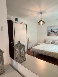 Ένα ή περισσότερα κρεβάτια σε δωμάτιο στο Alex Apartment Petrovac