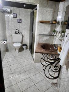Koupelna v ubytování Chalé com Jacuzzi em Morretes