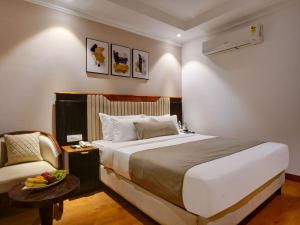 Postel nebo postele na pokoji v ubytování Hotel Sapphire Dx 1 Minutes Walking Distance From New Delhi Railway Station