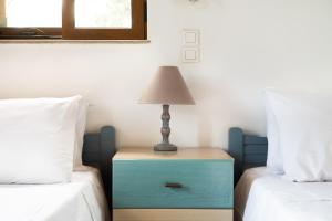 A bed or beds in a room at Maistroshome