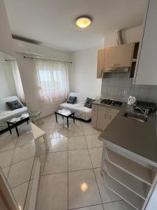 Kuchyň nebo kuchyňský kout v ubytování Apartmani Ana Juricev Vodice