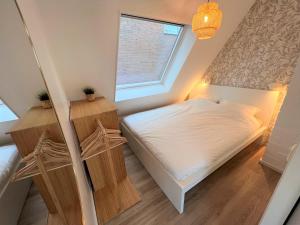 Ένα ή περισσότερα κρεβάτια σε δωμάτιο στο Moana3 Seaview