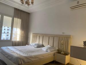 Postel nebo postele na pokoji v ubytování Appartamento di classe ed elegante