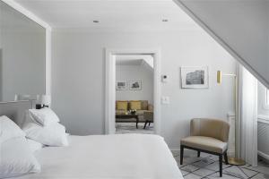 Llit o llits en una habitació de Storchen Zürich - Lifestyle Boutique Hotel