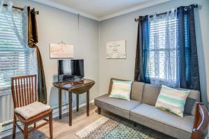 a living room with a couch and a table at Hampton Vacation Rental Central Location, Patio in Hampton