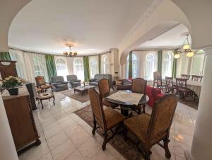 a living room with a table and chairs at Holiday home in Gardony - Velence-See 20604 in Gárdony