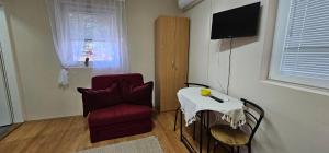 TV a/nebo společenská místnost v ubytování Apartmani Jasminka