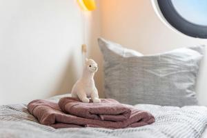 Postel nebo postele na pokoji v ubytování Nova Ferienhaus, 50qm + 28 fotografií