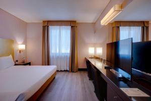 TV a/nebo společenská místnost v ubytování Hotel Nord