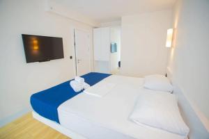 Voodi või voodid majutusasutuse MY SUNSHINE APARTMENTS BATuMI toas