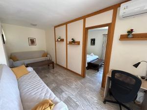 Postel nebo postele na pokoji v ubytování Magda Hotel Apartments