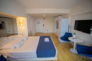 Voodi või voodid majutusasutuse MY SUNSHINE APARTMENTS BATuMI toas