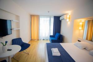 Voodi või voodid majutusasutuse MY SUNSHINE APARTMENTS BATuMI toas