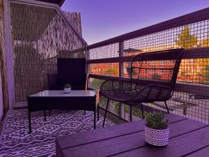 a balcony with a chair and a table at Modern, Central, Haven, 1BR with Balcony in Sheffield