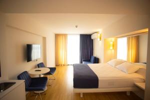 Voodi või voodid majutusasutuse MY SUNSHINE APARTMENTS BATuMI toas
