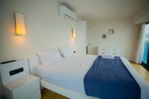 Voodi või voodid majutusasutuse MY SUNSHINE APARTMENTS BATuMI toas